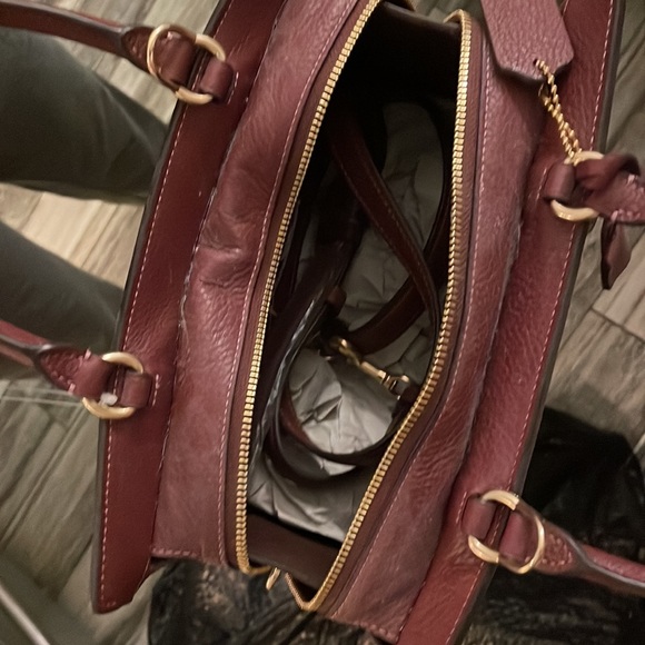 Coach medium hand bag.  About 7 inches wide.  More maroon than purple. - Picture 3 of 3